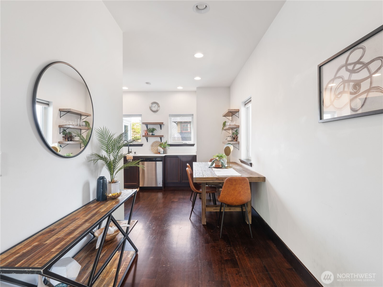 2019 Cornwall Avenue Bellingham, WA 98225 - Photo 11 of 40 a workspace with furniture a rug and wooden floor