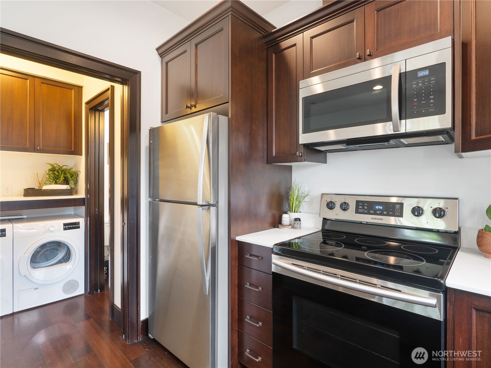 2019 Cornwall Avenue Bellingham, WA 98225 - Photo 16 of 40 a kitchen with a stove microwave and refrigerator