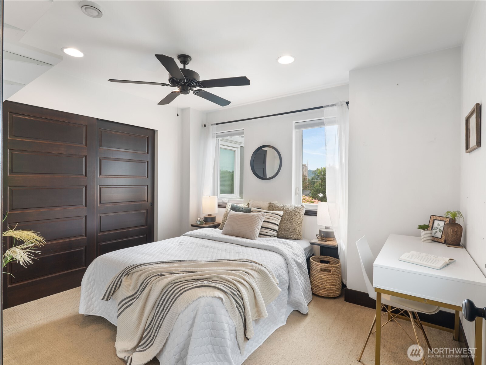 2019 Cornwall Avenue Bellingham, WA 98225 - Photo 26 of 40 a bedroom with a bed and a table