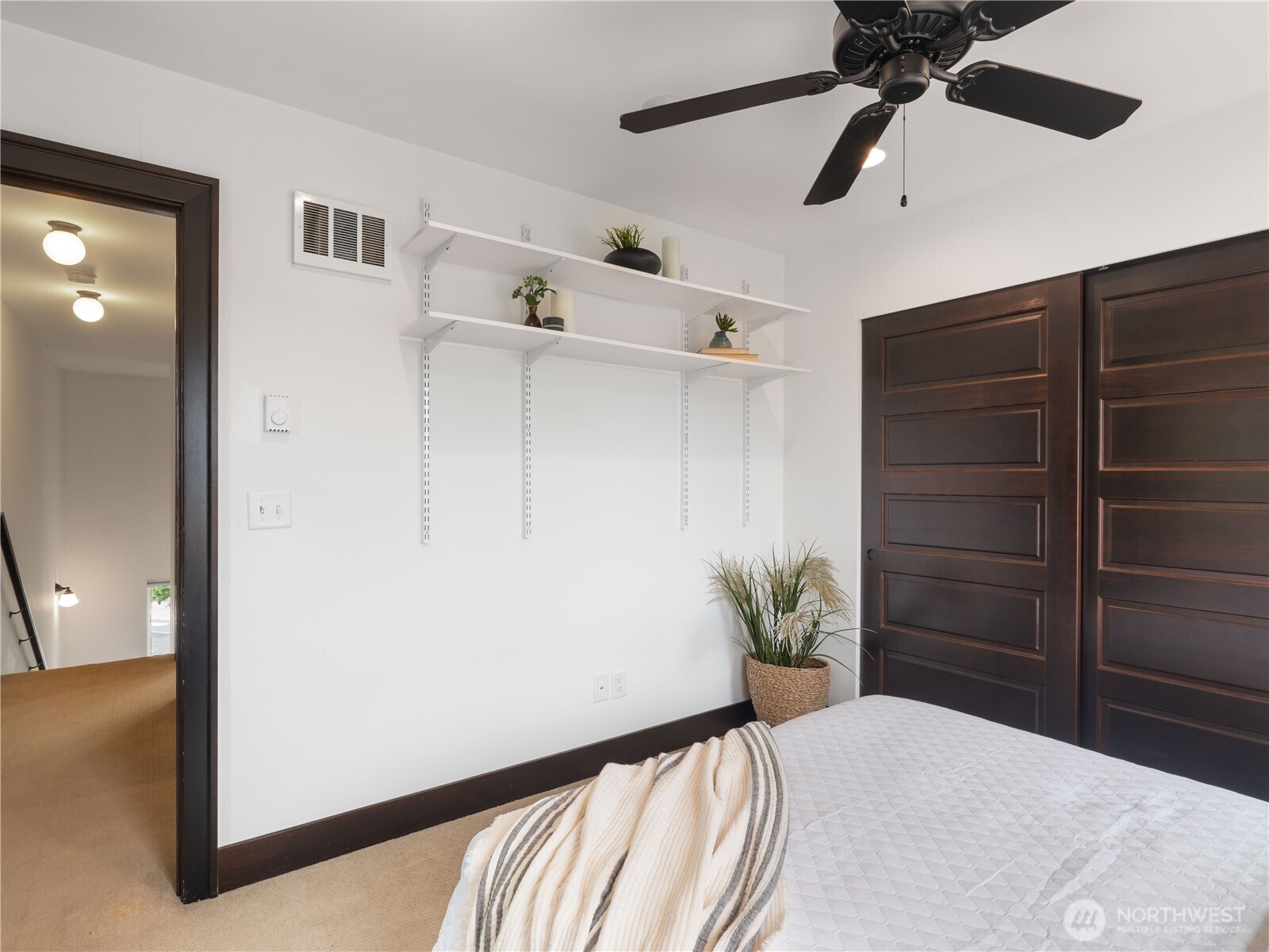 2019 Cornwall Avenue Bellingham, WA 98225 - Photo 28 of 40 a bedroom with a bed and a closet