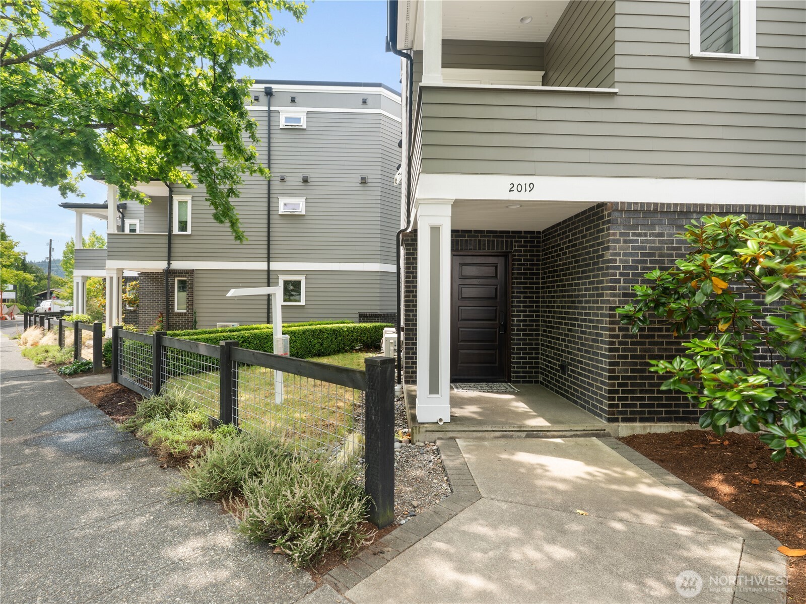2019 Cornwall Avenue Bellingham, WA 98225 - Photo 33 of 40 a front view of a house with garden