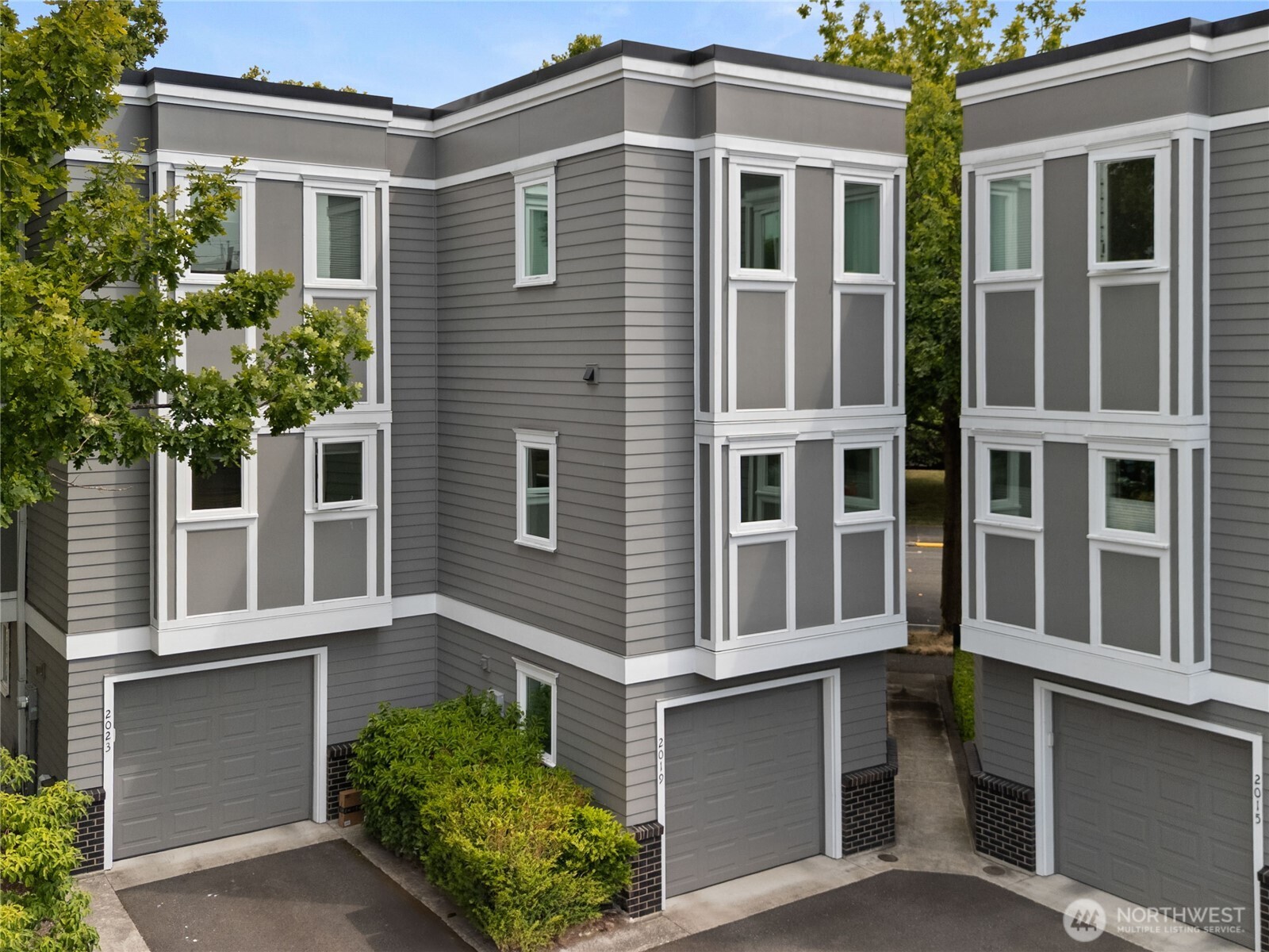 2019 Cornwall Avenue Bellingham, WA 98225 - Photo 36 of 40 a front view of a house with a yard