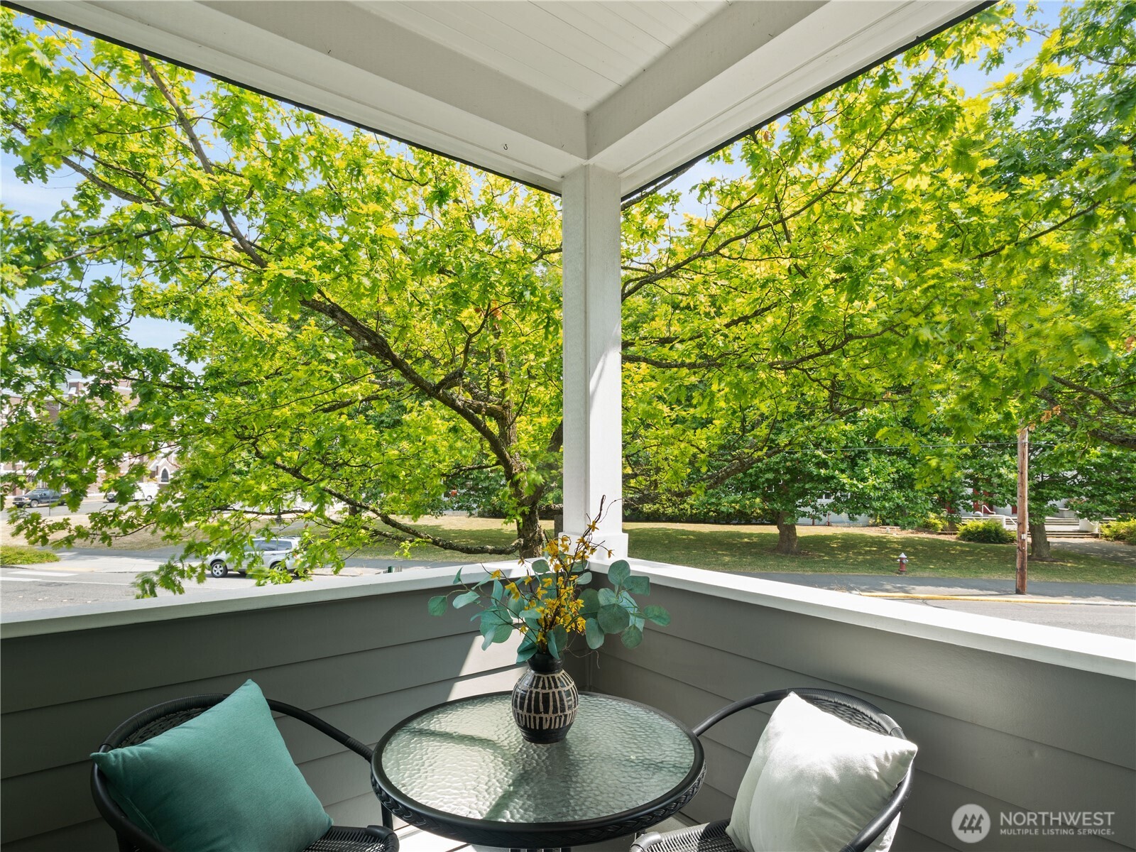 2019 Cornwall Avenue Bellingham, WA 98225 - Photo 7 of 40 a dining room with furniture and a potted plant