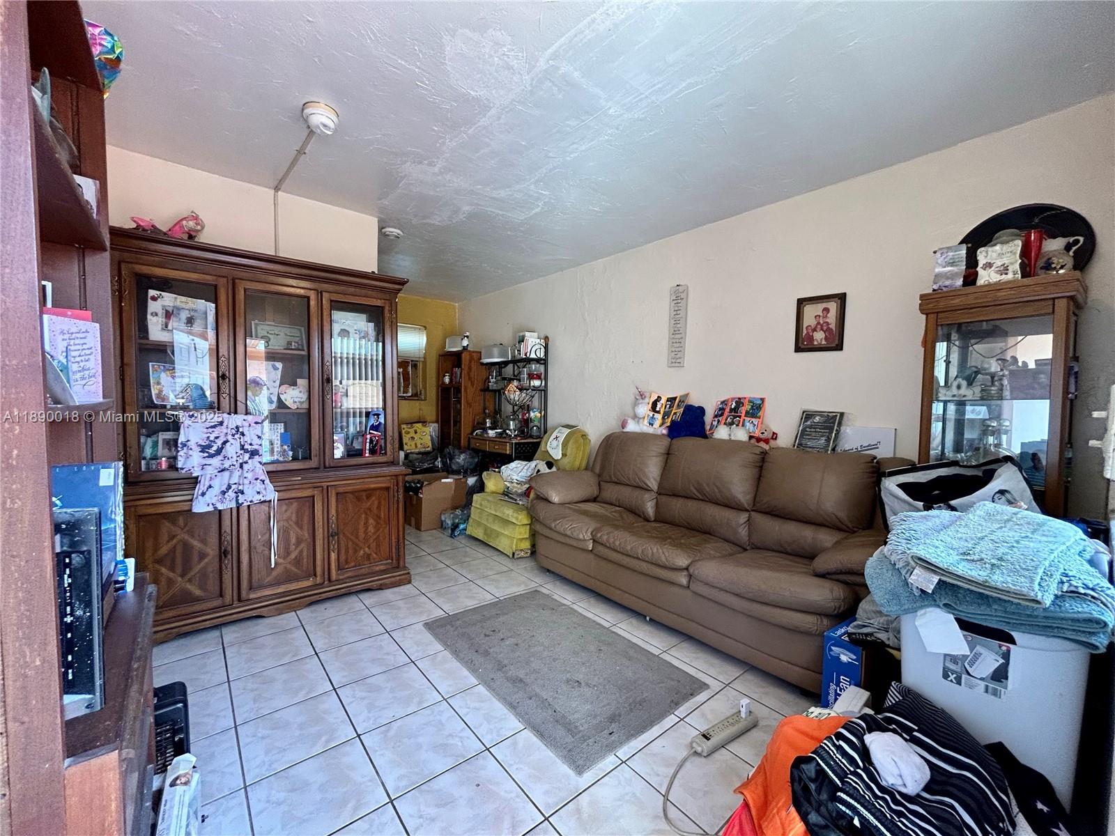 2013 Washington Avenue Opa-Locka, FL 33054 - Photo 14 of 19 a living room with furniture and wooden floor