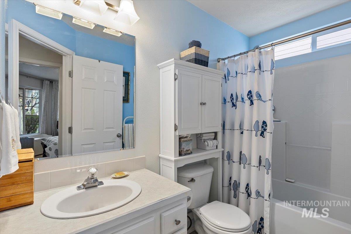 3357 West Fieldstream Lane Meridian, ID 83646 - Photo 19 of 24 Bathroom featuring healthy amount of natural light, ensuite bath, vanity, and shower / tub combo
