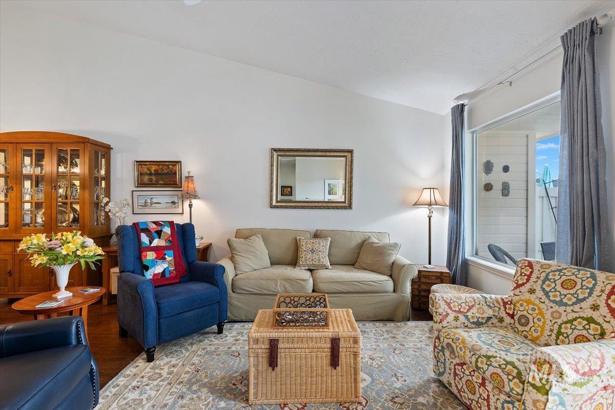 3357 West Fieldstream Lane Meridian, ID 83646 - Photo 6 of 24 Living area with vaulted ceiling and wood finished floors