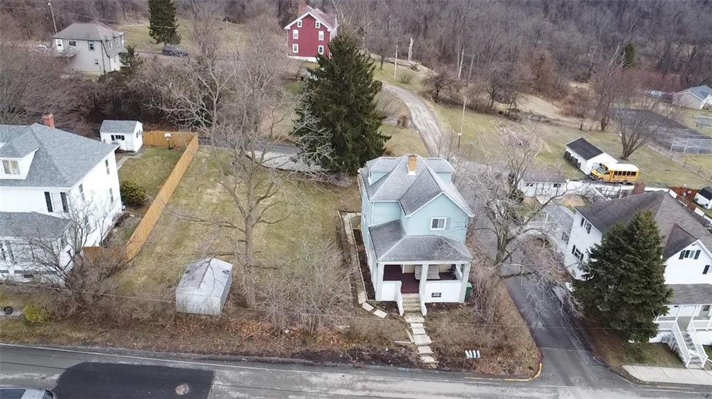 230 Maple Street Everson, PA 15631 - Photo 11 of 32 an aerial view of a house with a yard