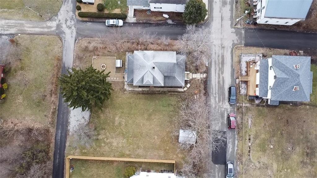 230 Maple Street Everson, PA 15631 - Photo 12 of 32 a picture of a bathroom with a sink and a mirror
