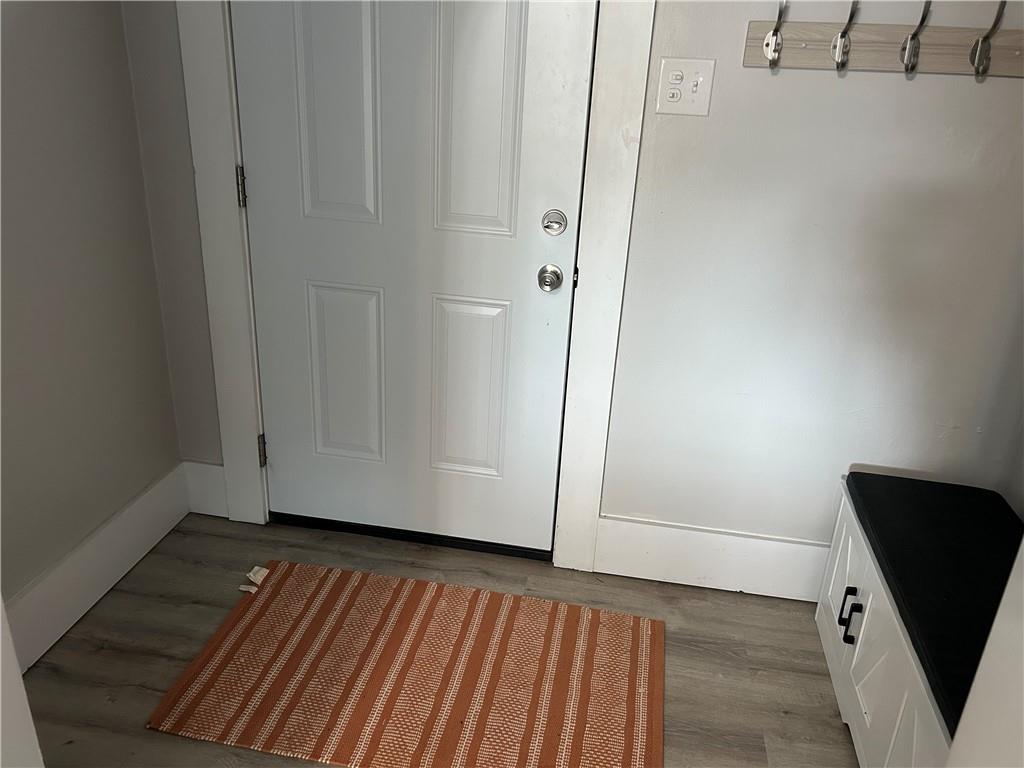 230 Maple Street Everson, PA 15631 - Photo 15 of 32 a view of a hardwood floor and wardrobe