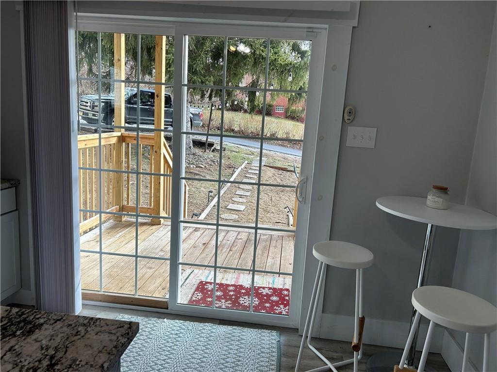 230 Maple Street Everson, PA 15631 - Photo 22 of 32 a living room with furniture and a window