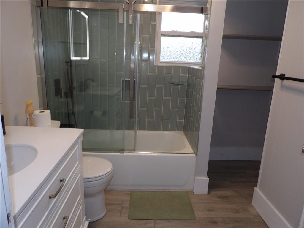 230 Maple Street Everson, PA 15631 - Photo 26 of 32 a bathroom with a sink a toilet and shower