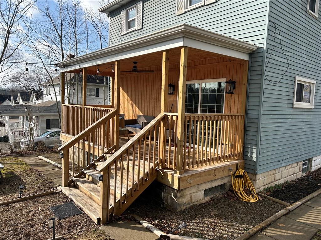230 Maple Street Everson, PA 15631 - Photo 9 of 32 a view of a house with wooden fence