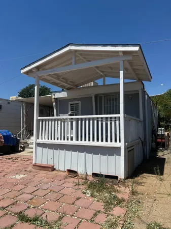 a view of a house with a roof deck