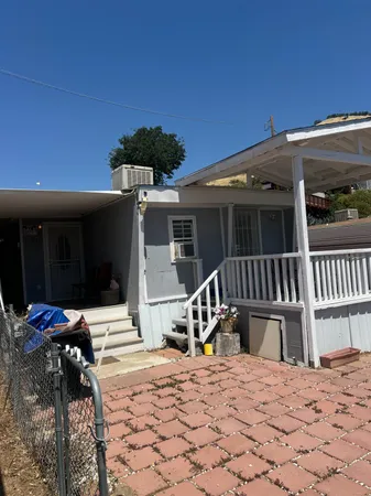 a view of a house with a patio