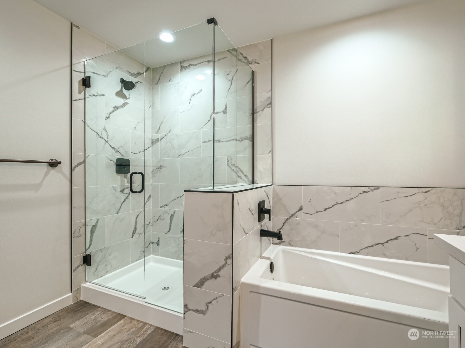 204 Date Avenue Sultan, WA 98294 - Photo 13 of 18 a bathroom with a bathtub and a shower