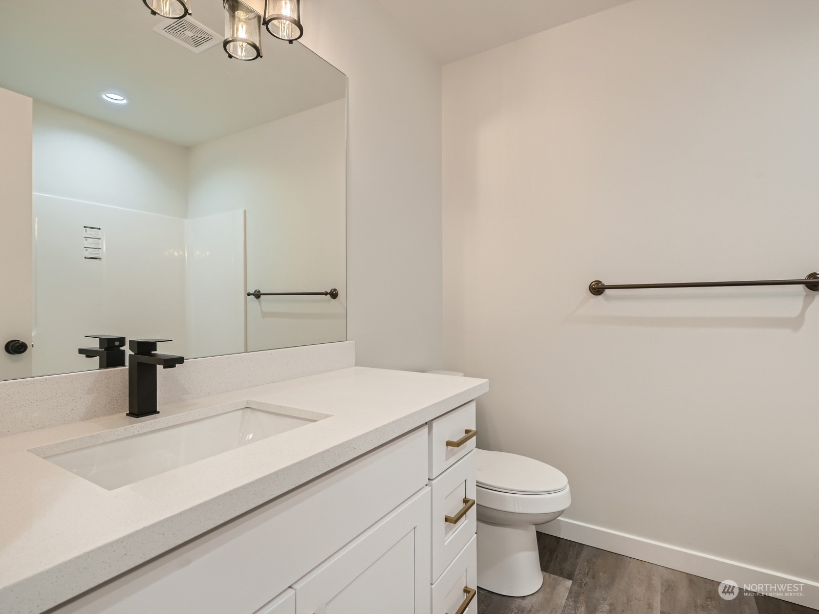 204 Date Avenue Sultan, WA 98294 - Photo 16 of 18 a bathroom with a sink toilet and vanity