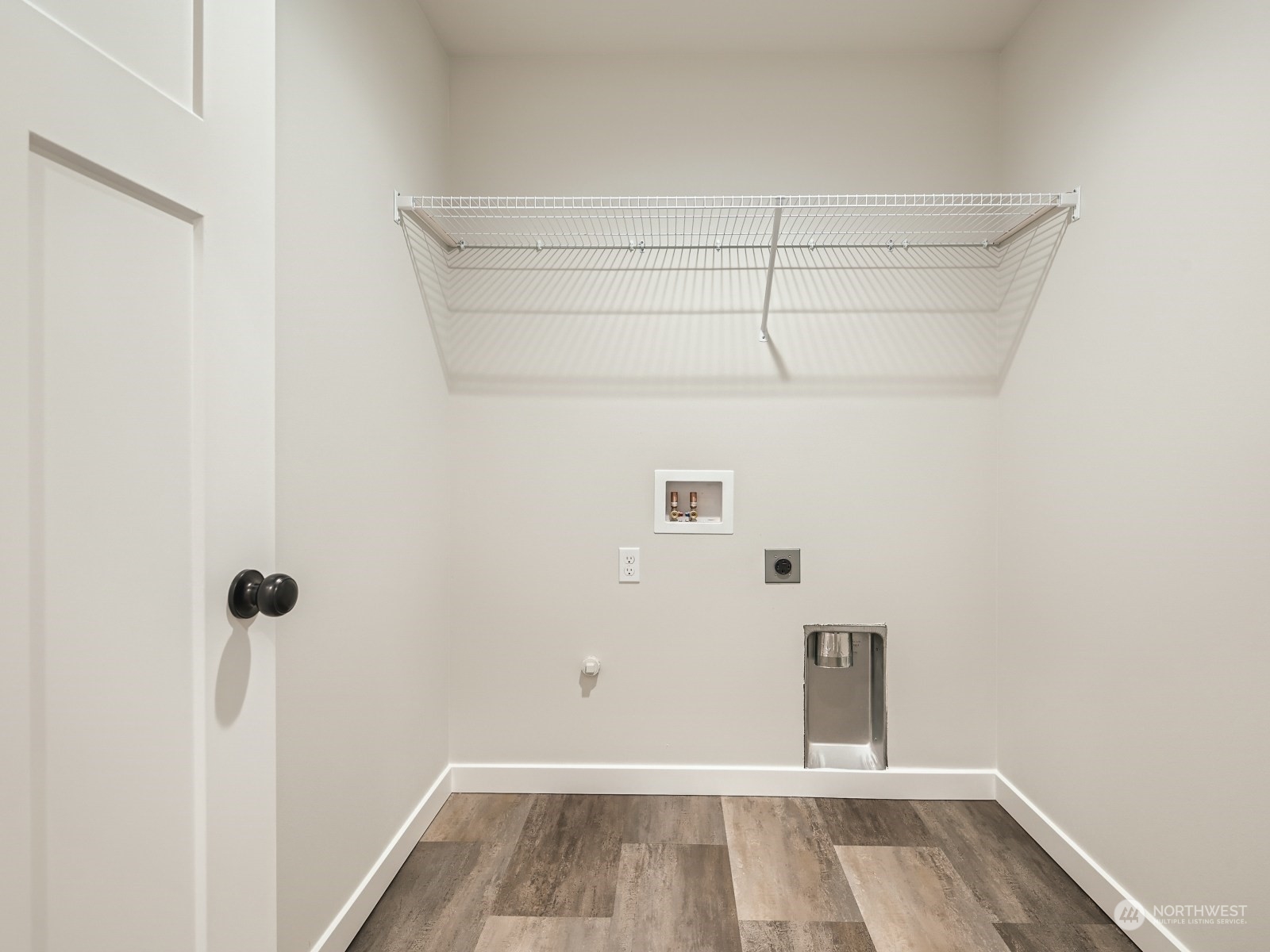 204 Date Avenue Sultan, WA 98294 - Photo 17 of 18 a view of a room with racks on the wall