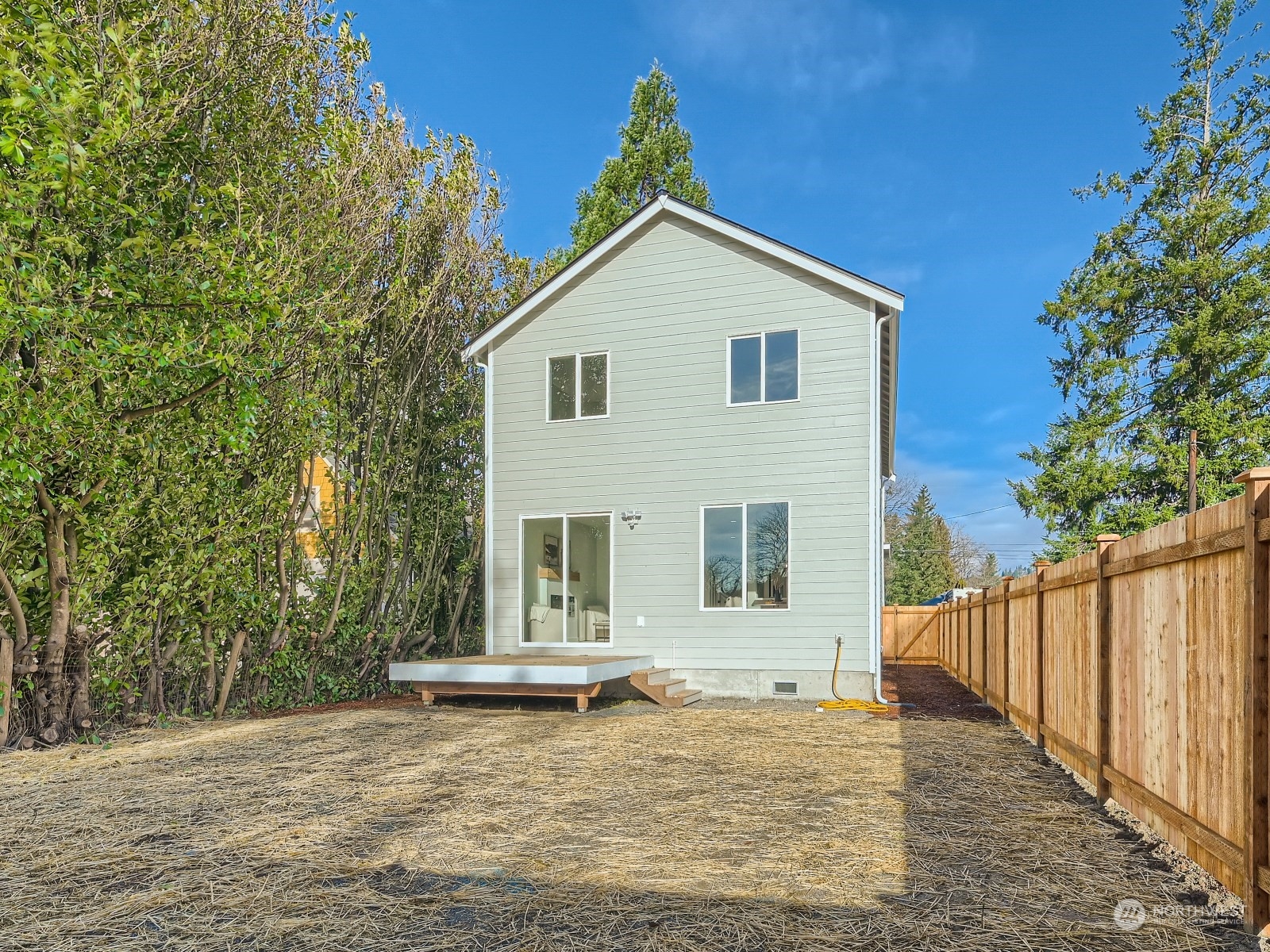204 Date Avenue Sultan, WA 98294 - Photo 18 of 18 a view of a house with wooden fence