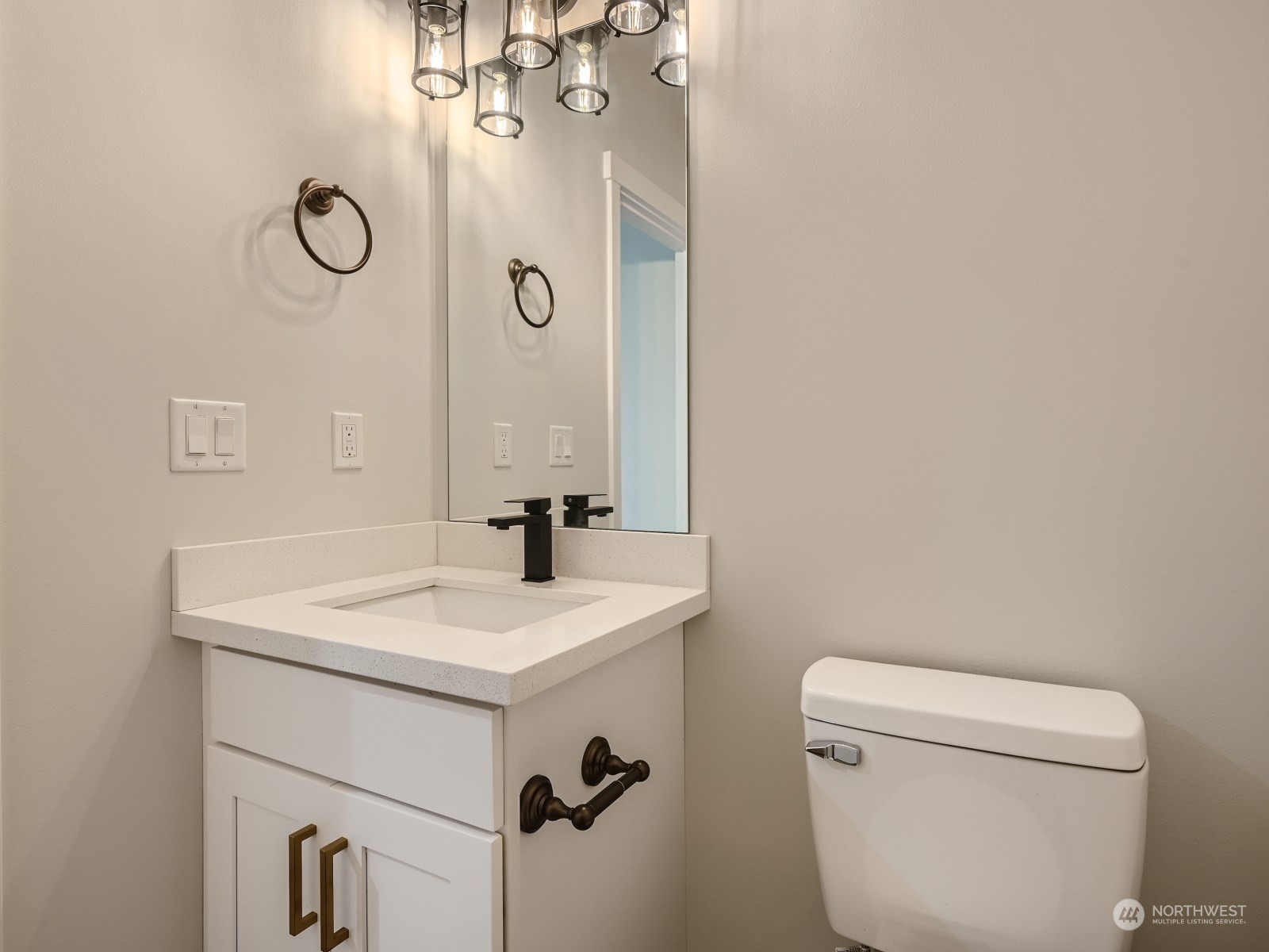 204 Date Avenue Sultan, WA 98294 - Photo 10 of 18 a bathroom with a sink toilet and mirror
