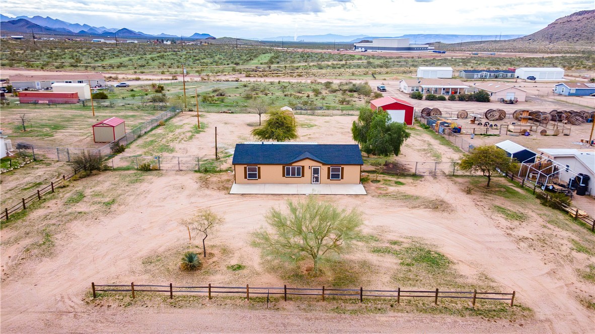 3248 West Carmichael Road Golden Valley, AZ 86413 - Photo 48 of 53 Aerial view of sparsely populated area with mountains