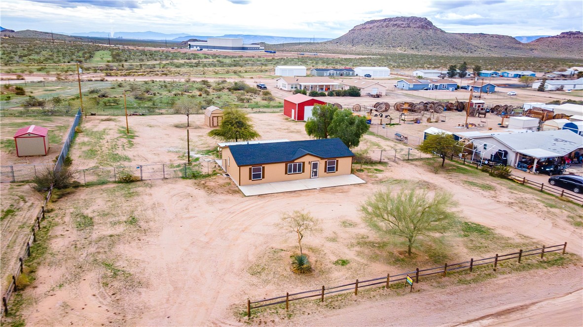 3248 West Carmichael Road Golden Valley, AZ 86413 - Photo 49 of 53 Overview of rural landscape with a mountainous background
