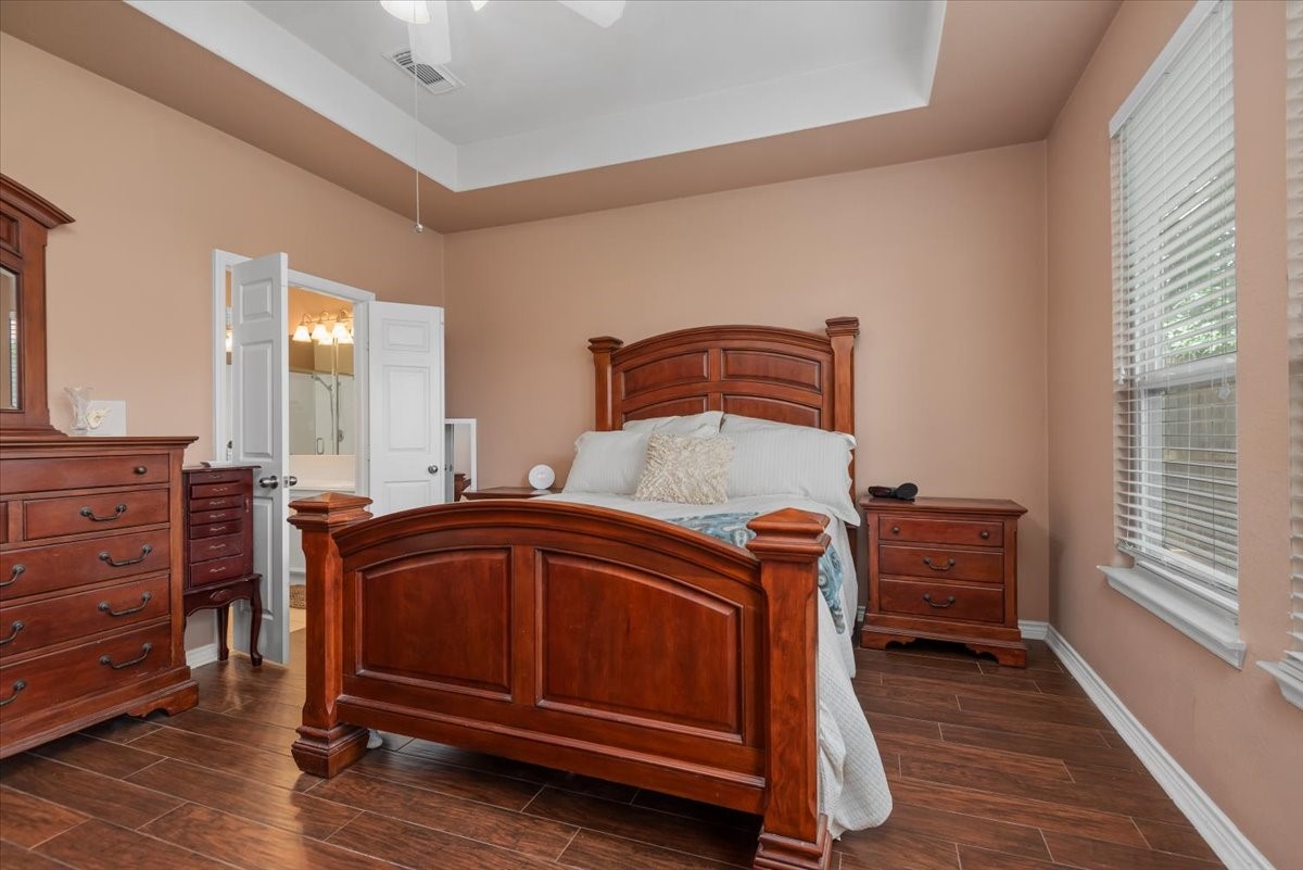 19222 Holly Shade Court Spring, TX 77379 - Photo 19 of 37 Tray ceilings give this room a polished look.