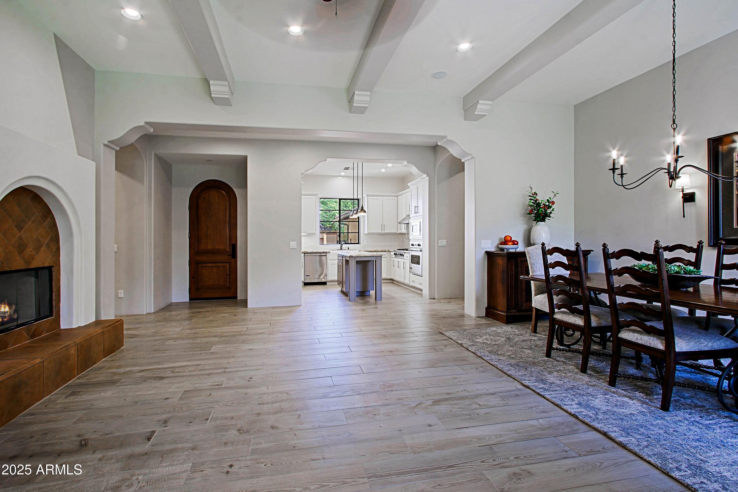 18650 North Thompson Peak Parkway, Unit 1052 Scottsdale, AZ 85255 - Photo 11 of 38 a view of a living room and dining room