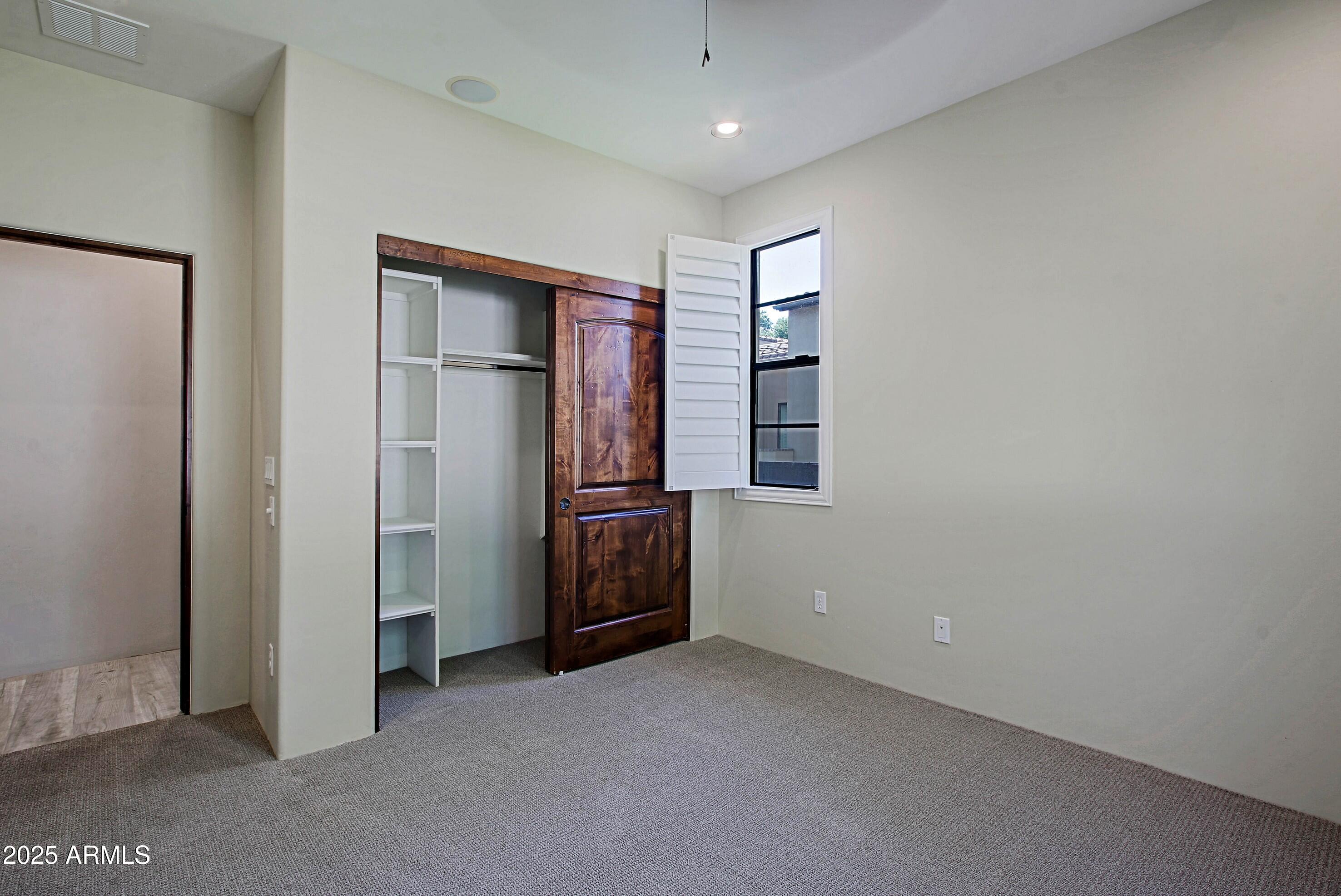 18650 North Thompson Peak Parkway, Unit 1052 Scottsdale, AZ 85255 - Photo 23 of 38 a view of an empty room