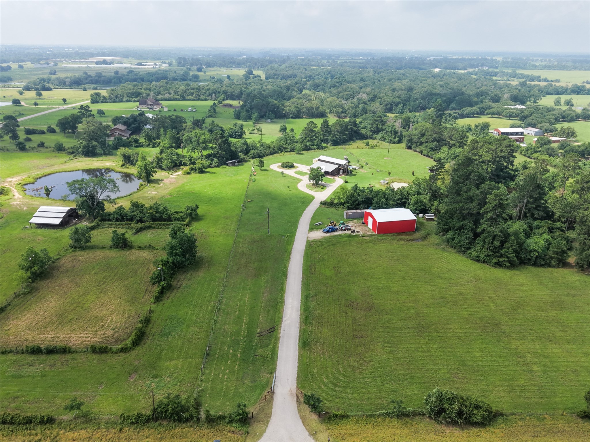 26534 Mitchell Road Hempstead, TX 77445 - Photo 43 of 45 an aerial view of green landscape with trees