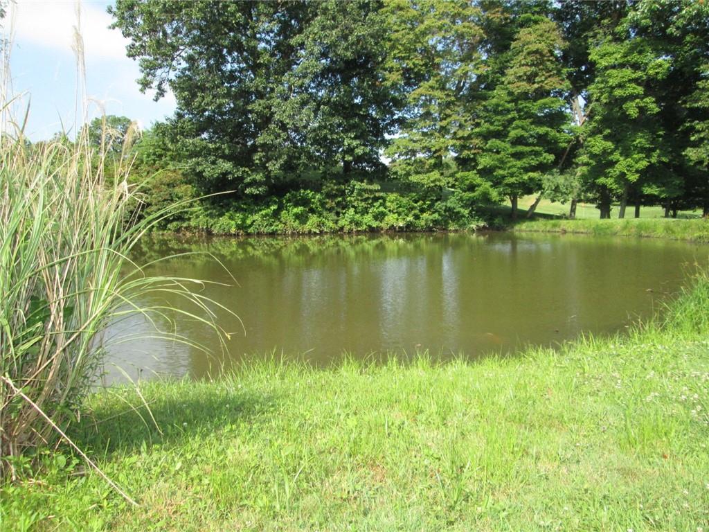 349-357 Ford City Road Freeport, PA 16229 - Photo 3 of 9 a view of a lake with a yard