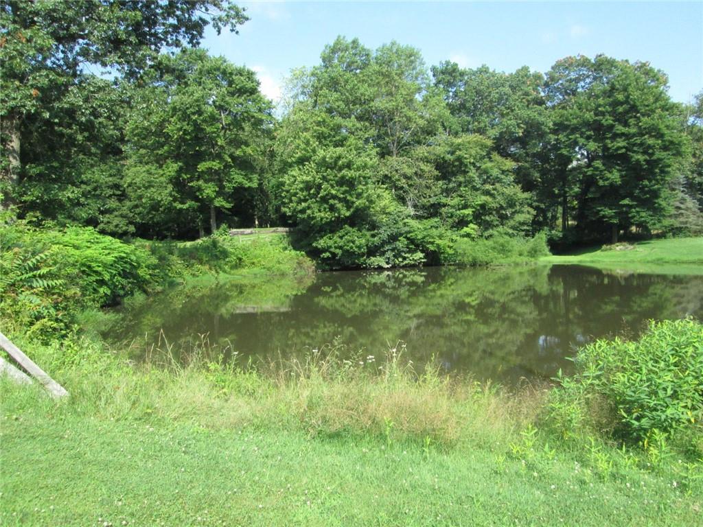 349-357 Ford City Road Freeport, PA 16229 - Photo 5 of 9 a view of a lush green space near a lake view