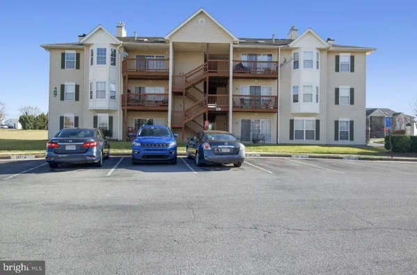 a car parked in front of a building