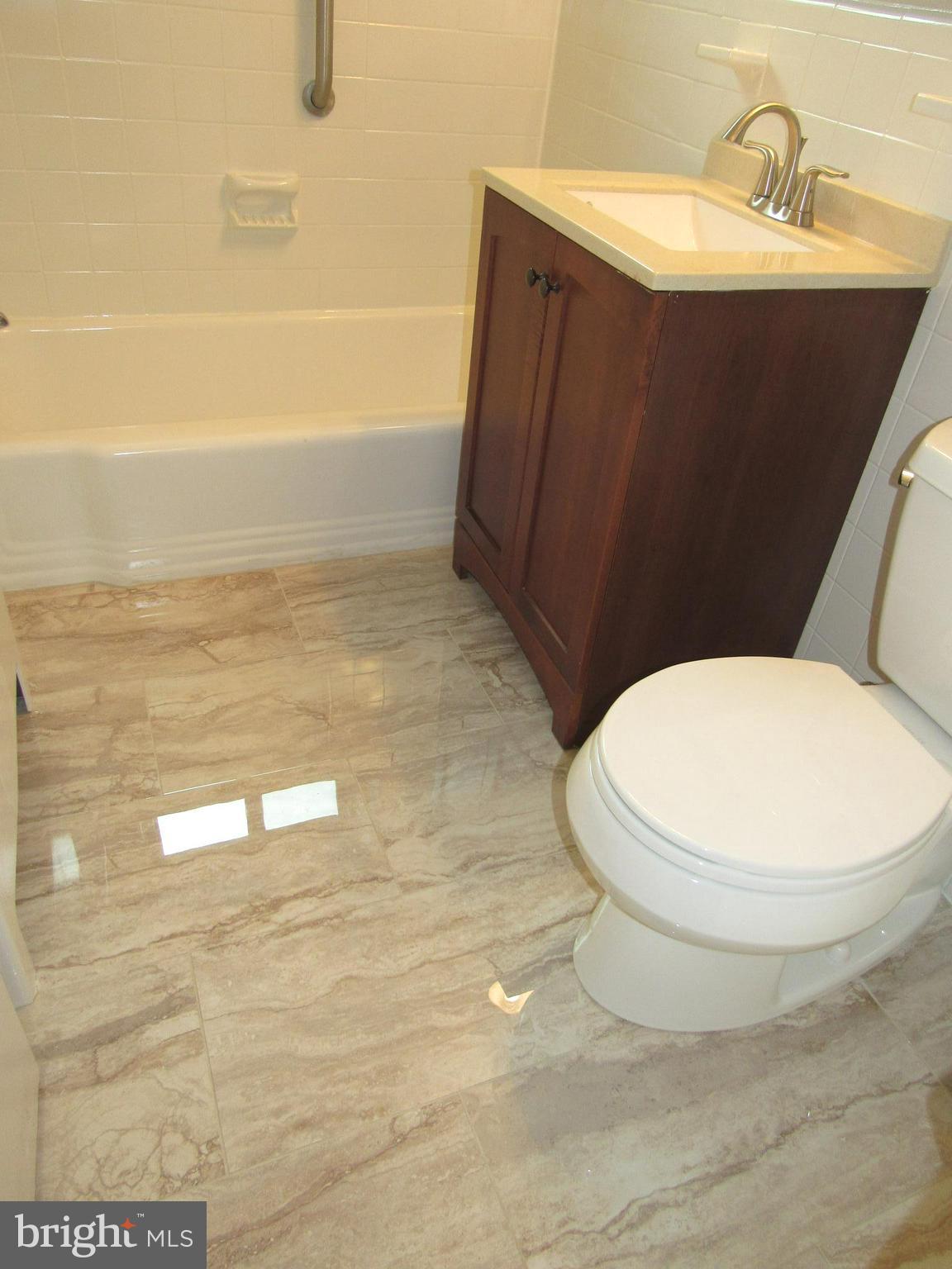 1300 South Arlington Ridge Road, Unit 617 Arlington, VA 22202 - Photo 14 of 25 a bathroom with a toilet and a sink
