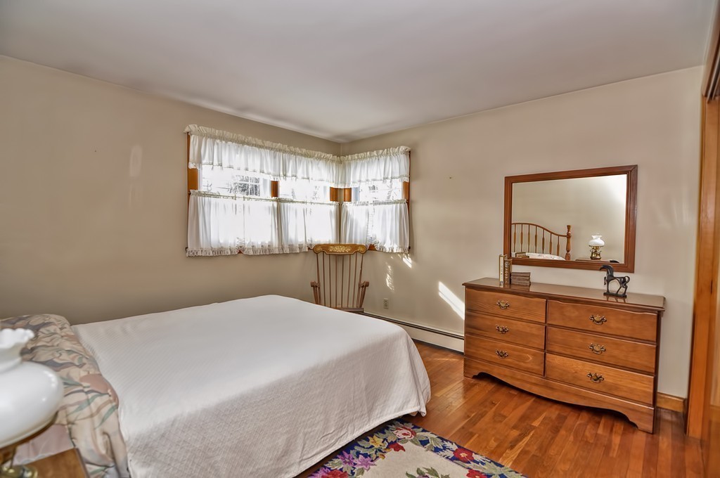 322 Purgatory Road Northbridge, MA 01588 - Photo 14 of 19 a bedroom with a bed and a dresser