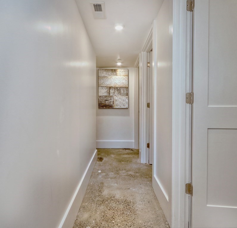 4 Everett Place, Unit 1 Boston, MA 02128 - Photo 13 of 19 a view of a hallway