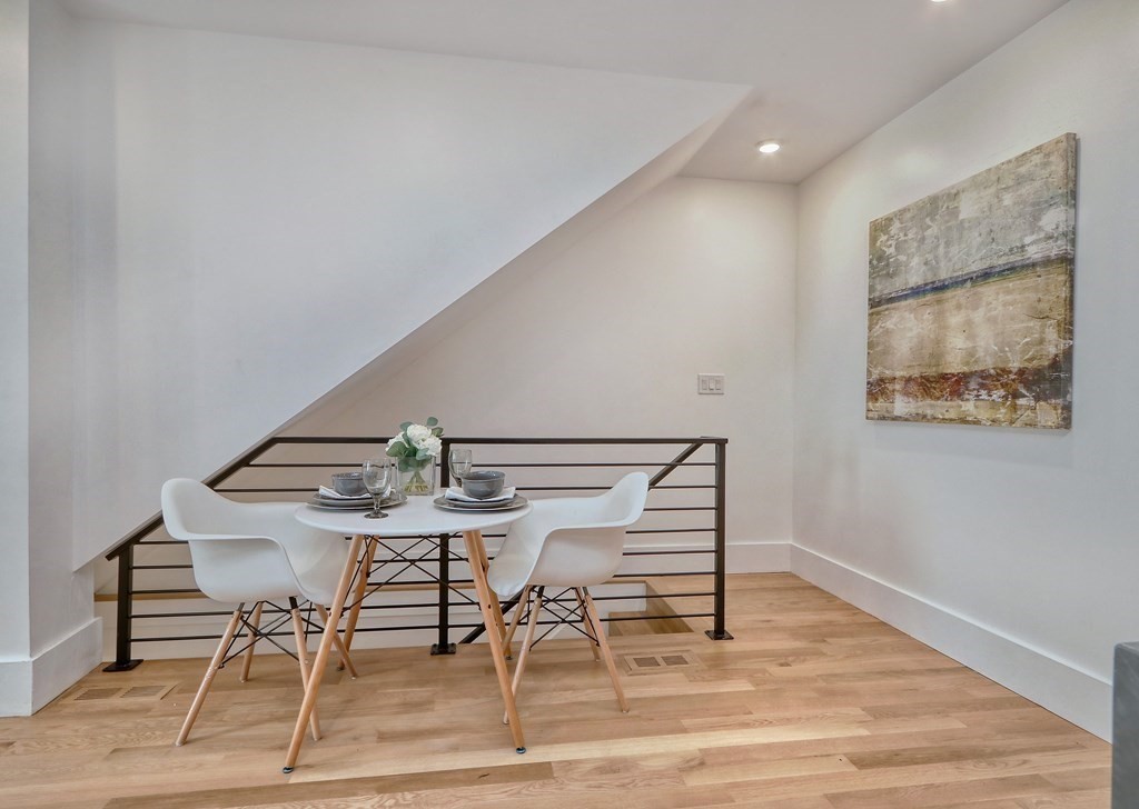4 Everett Place, Unit 1 Boston, MA 02128 - Photo 5 of 19 a view of a livingroom with furniture and wooden floor