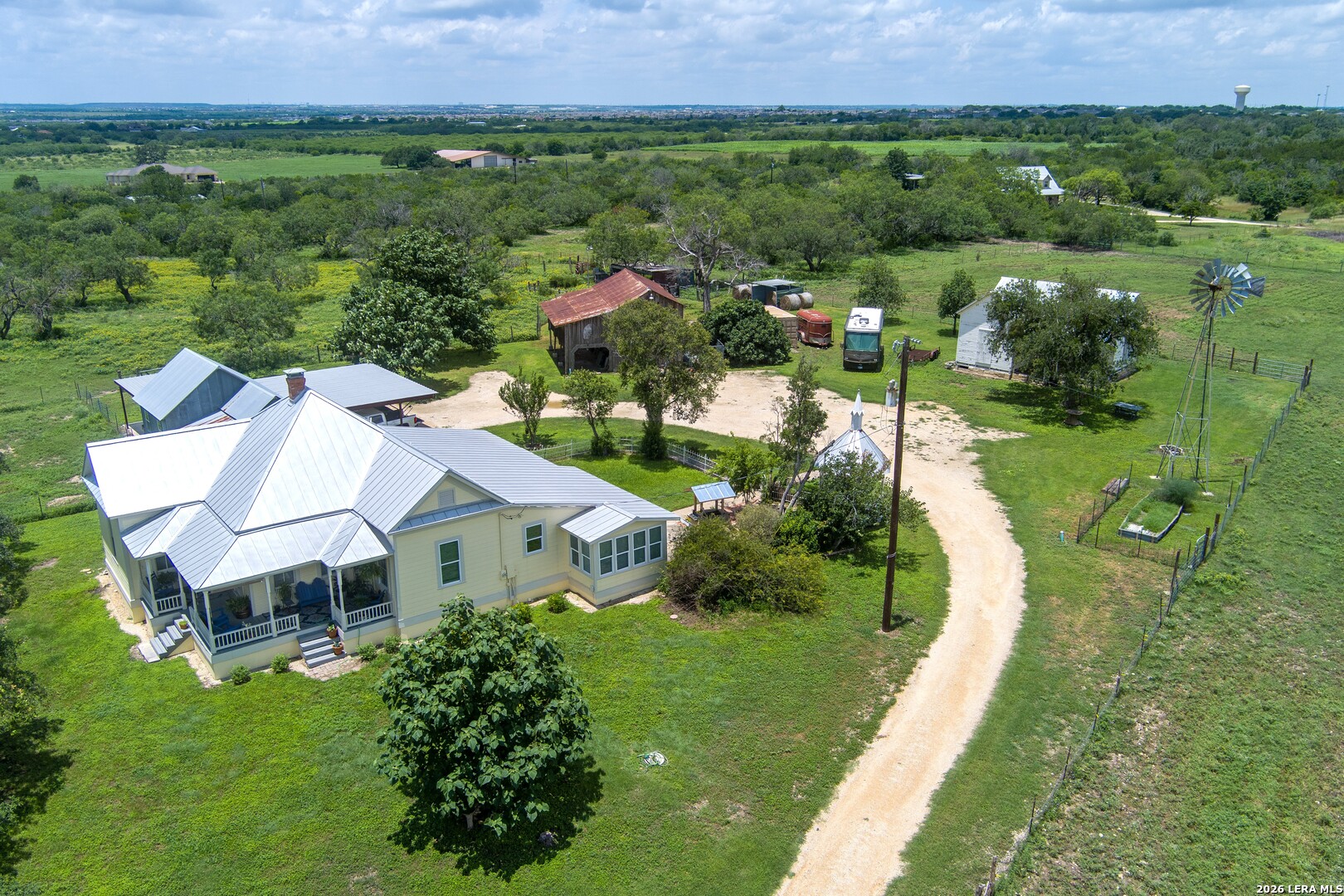 4515 Stapper Road St. Hedwig, TX 78152 - Photo 53 of 64 a aerial view of a house with a yard