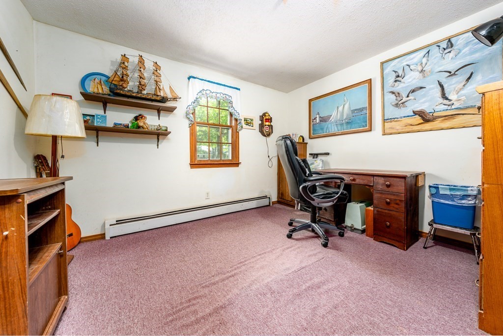 231 Monomoy Circle Barnstable, MA 02632 - Photo 24 of 28 a view of a workspace with furniture and a window