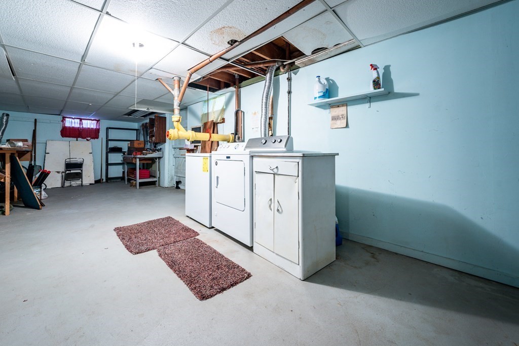 231 Monomoy Circle Barnstable, MA 02632 - Photo 25 of 28 a storage room with cabinets