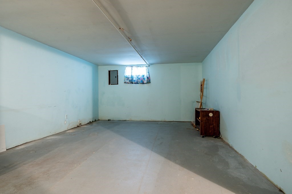 231 Monomoy Circle Barnstable, MA 02632 - Photo 27 of 28 an empty room with windows