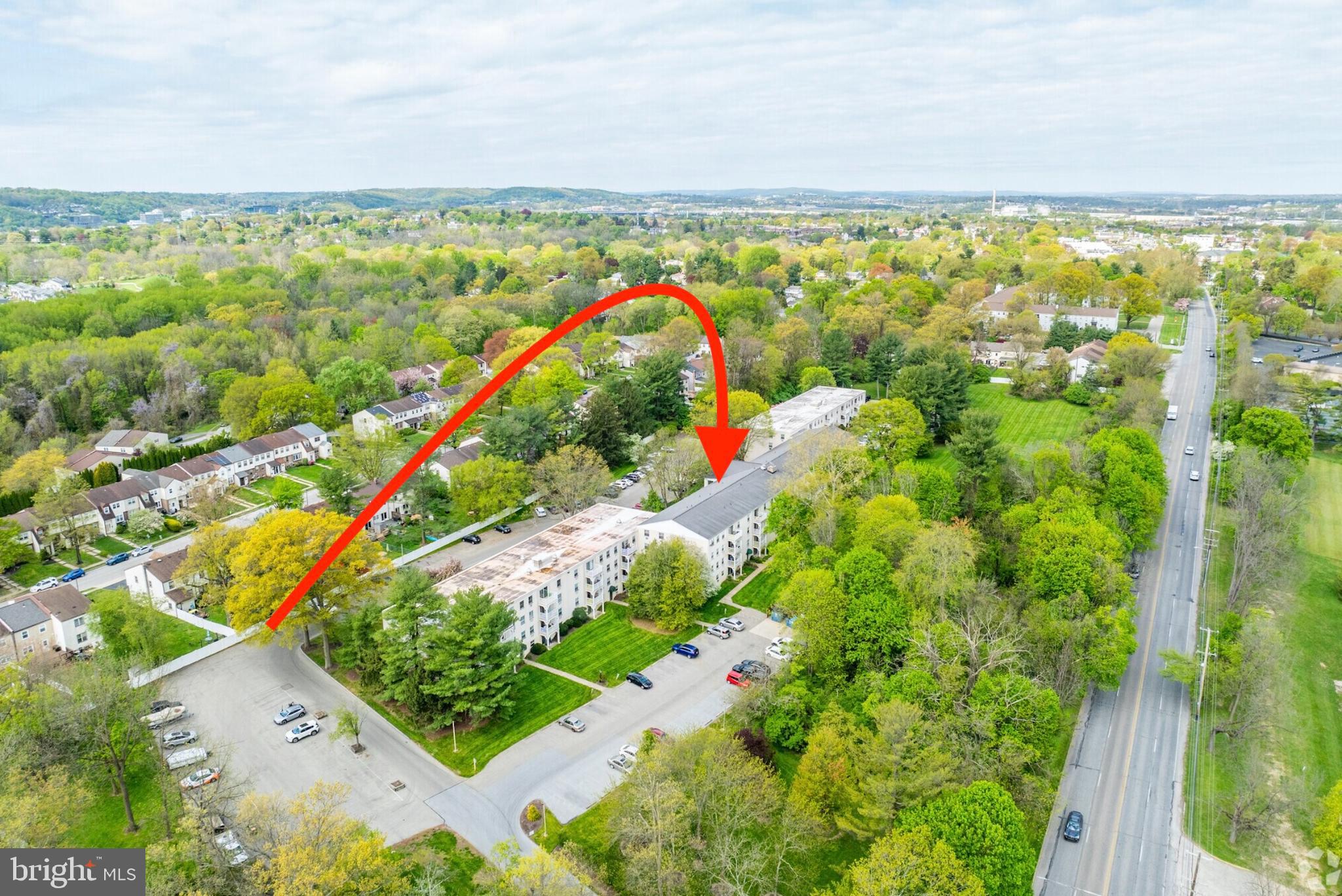 250 Ridge Pike, Unit CONDO 349 Lafayette Hill, PA 19444 - Photo 5 of 16 Scenic aerial view of lush residential area.