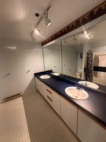 a kitchen with a sink and a stove