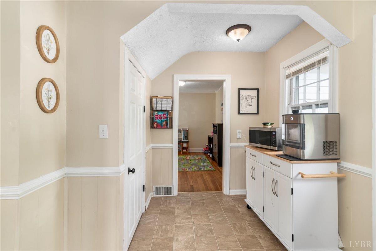 152 Pine Street Amherst, VA 24521 - Photo 14 of 53 a kitchen with a refrigerator and a stove