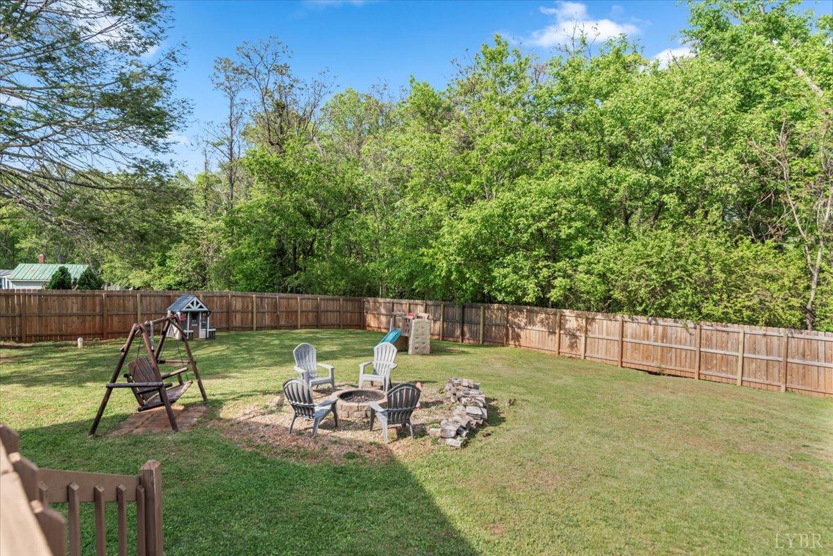 152 Pine Street Amherst, VA 24521 - Photo 3 of 53 a view of backyard with slide and slide