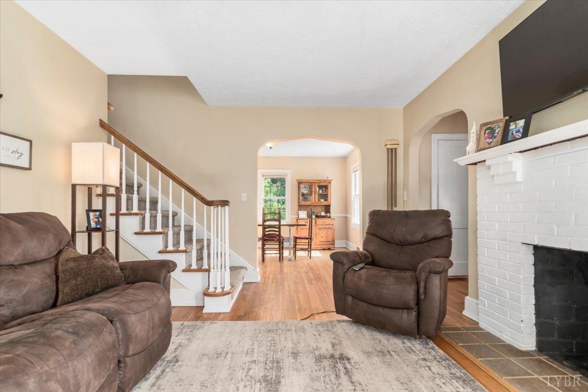 152 Pine Street Amherst, VA 24521 - Photo 5 of 53 a living room with furniture and a fireplace