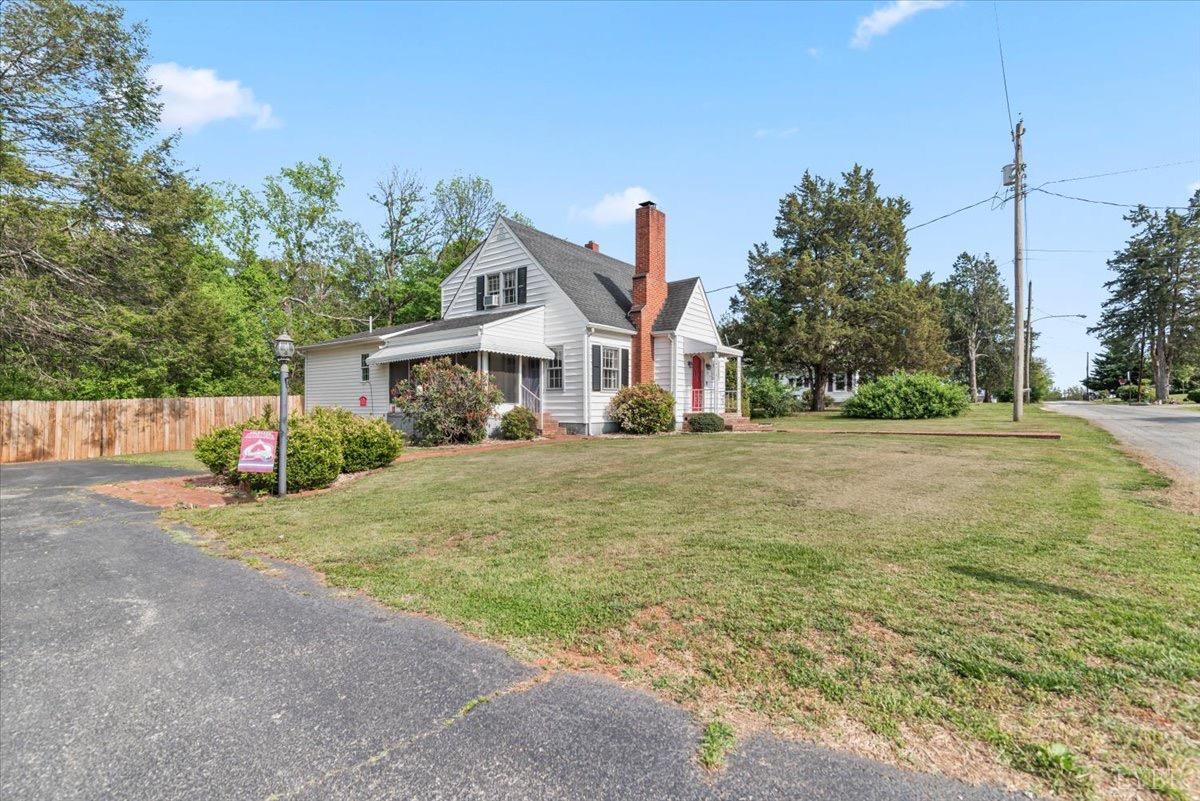 152 Pine Street Amherst, VA 24521 - Photo 51 of 53 a front view of a house with a yard and garage