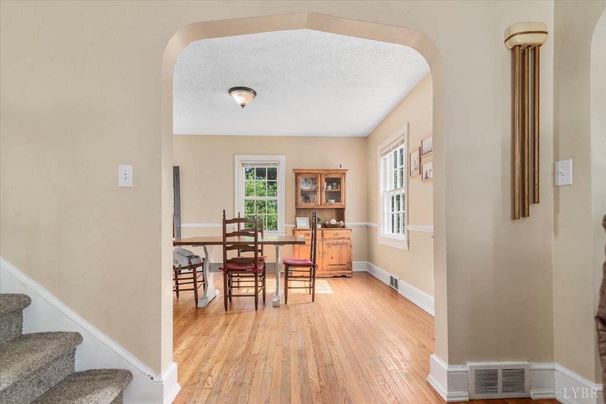 152 Pine Street Amherst, VA 24521 - Photo 6 of 53 a view of a livingroom with furniture and wooden floor
