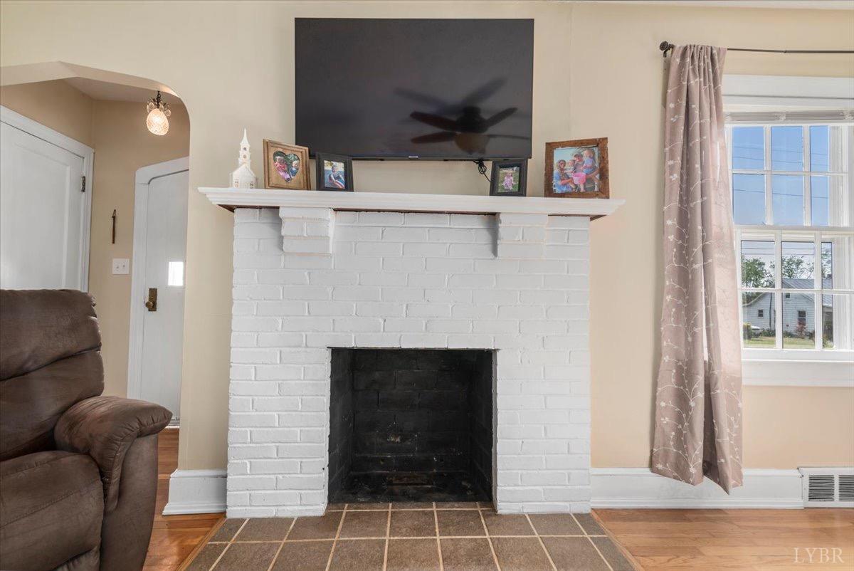 152 Pine Street Amherst, VA 24521 - Photo 8 of 53 a living room with furniture and a fireplace