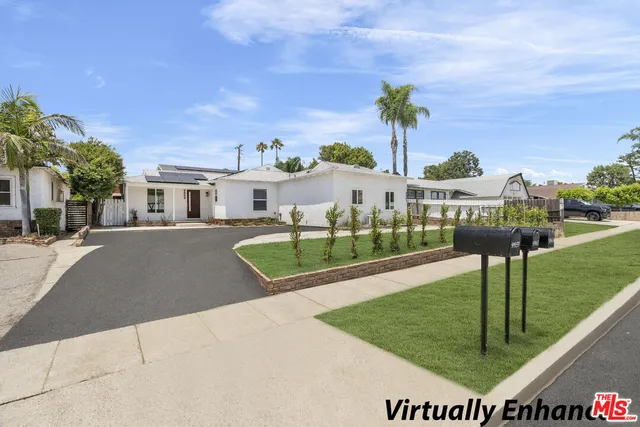 a view of a house with a park