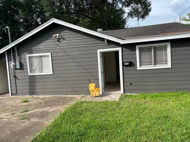 a front view of a house with garage